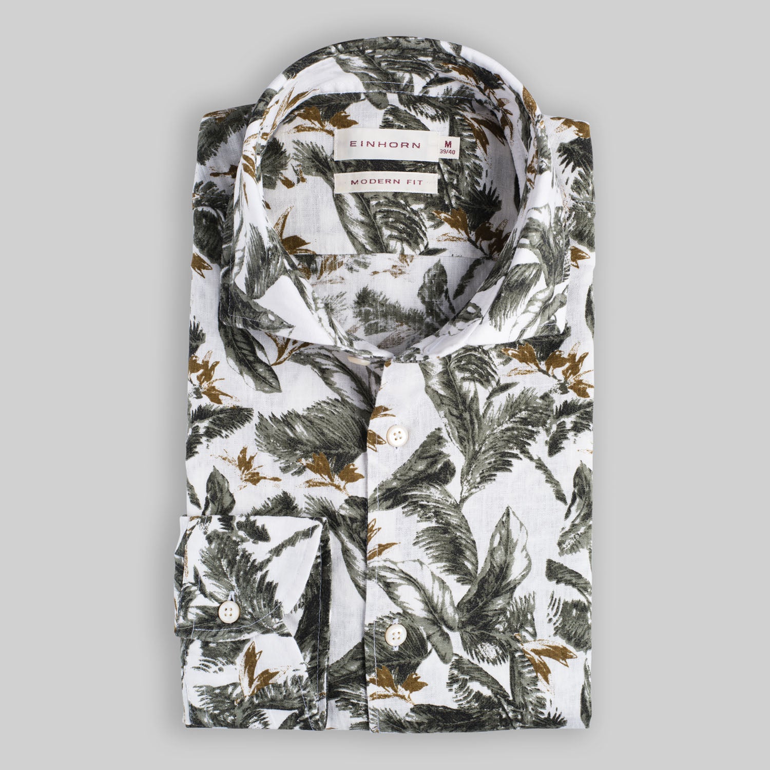 Das Einhorn Hemd Modern Fit Palmendruck Grün verbindet sommerliche Lässigkeit mit eleganter Leichtigkeit.