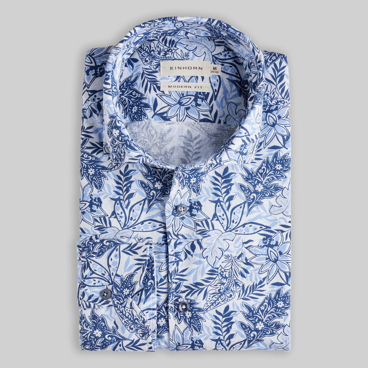 Das Einhorn Leinenbaumwollhemd mit floralem Print Modern Fit Blau vereint sommerliche Leichtigkeit mit eleganter Musterung.